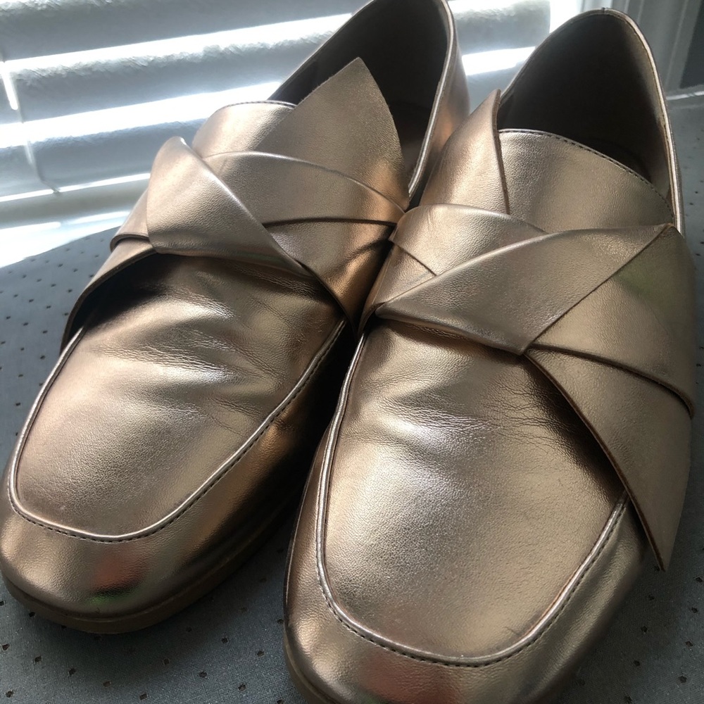 Gold loafers.